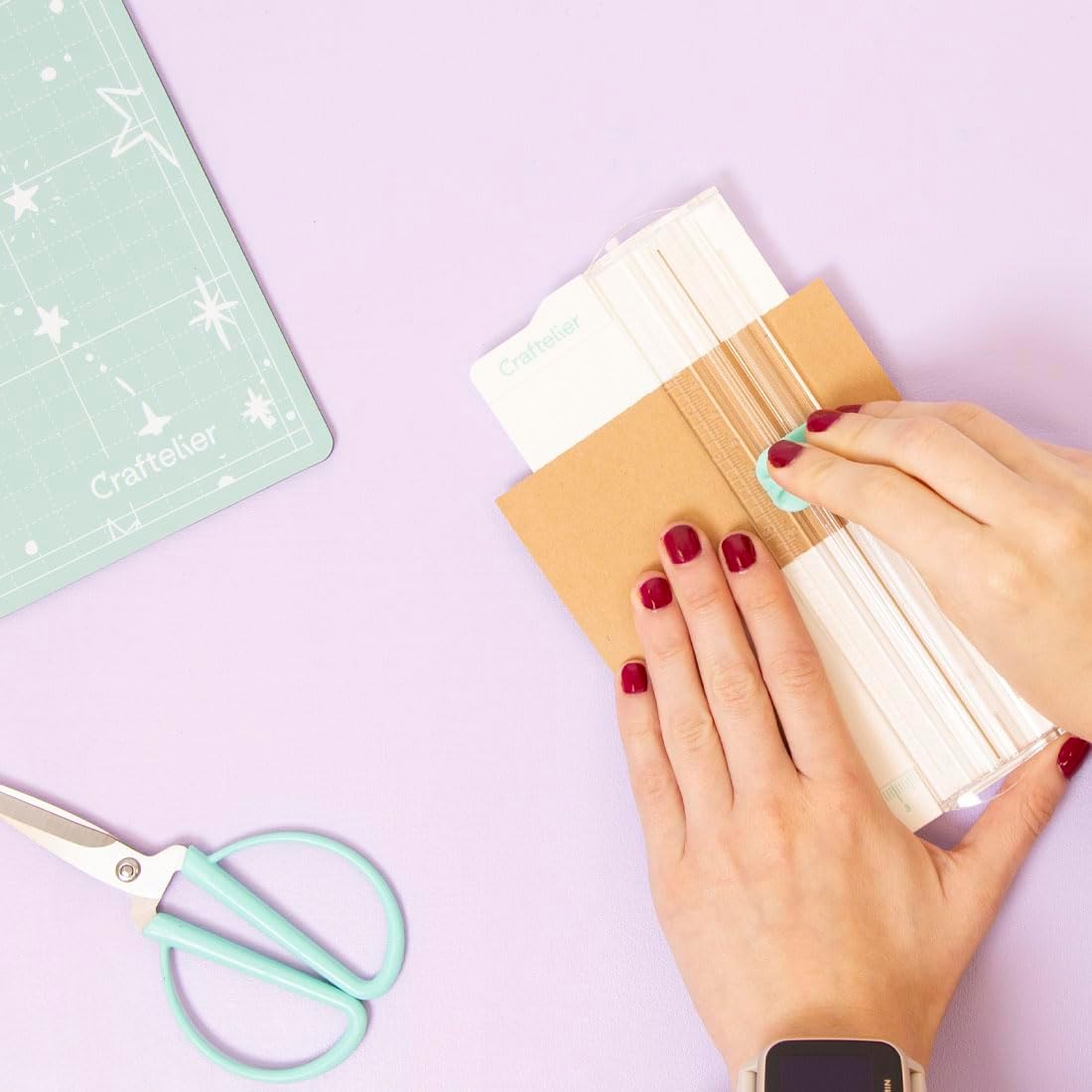 Craftelier - Mini portable cutter to measure and cut paper and cardboard for scrapbooking or crafting with folding tool, blade and transparent ruler | Dimensions 6.5 x 15.3 cm