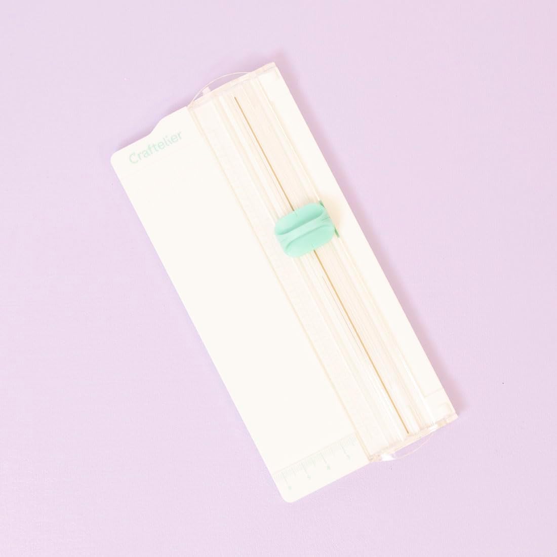 Craftelier - Mini portable cutter to measure and cut paper and cardboard for scrapbooking or crafting with folding tool, blade and transparent ruler | Dimensions 6.5 x 15.3 cm